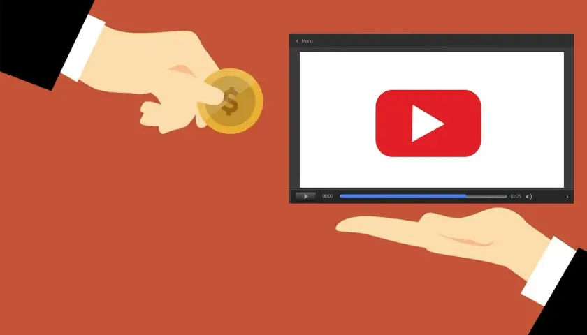 Dostajesz rekompensatę za opóźnienie dostawy w postaci monety, która spada na otwartą dłoń przed ekranem z logo YouTube.